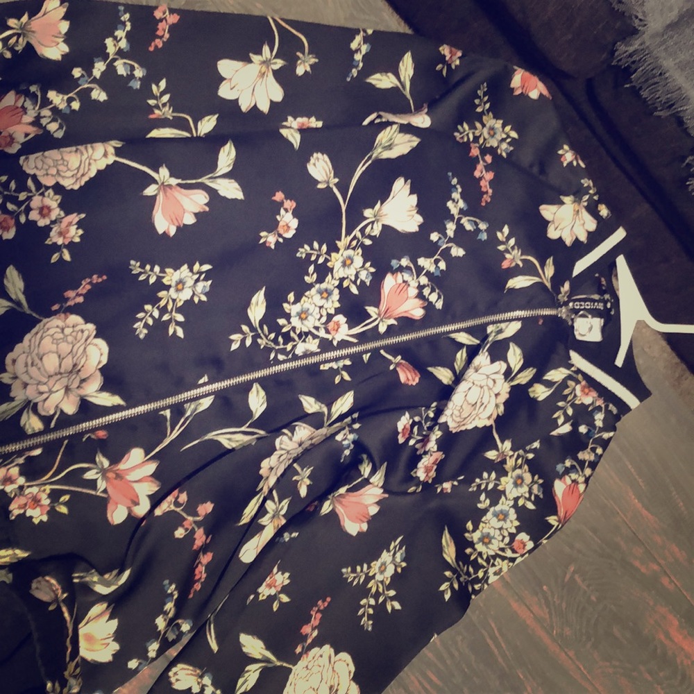 A silky blazer with a beautiful floral pattern